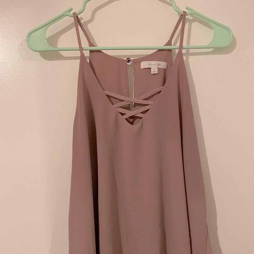 Pale pink tank top with crisscross